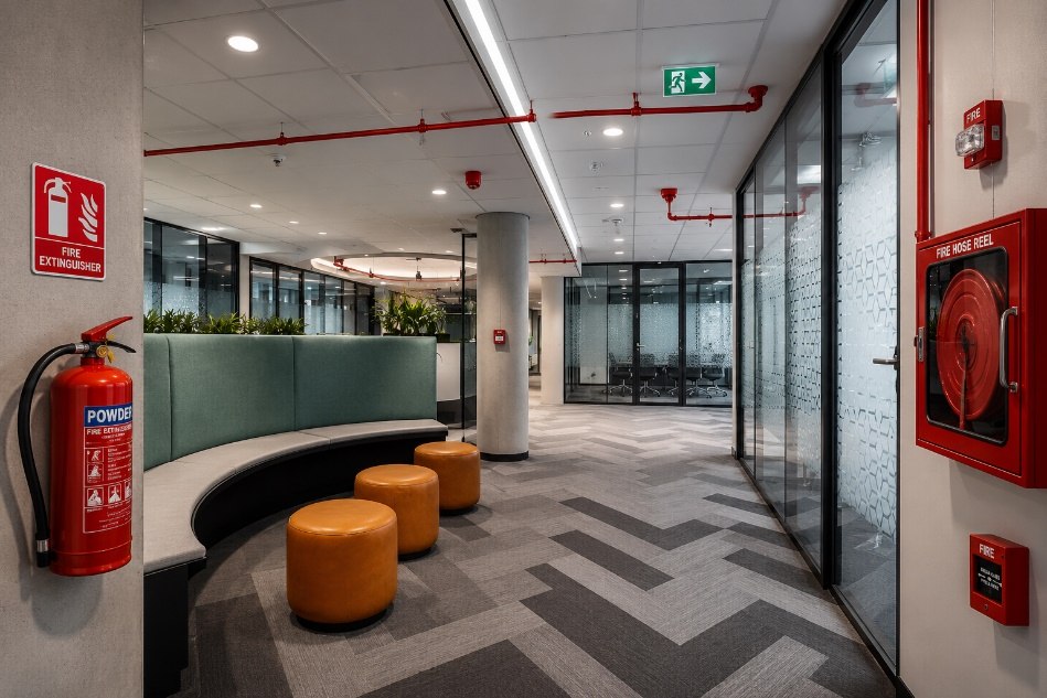Modern office interior with integrated fire safety equipment